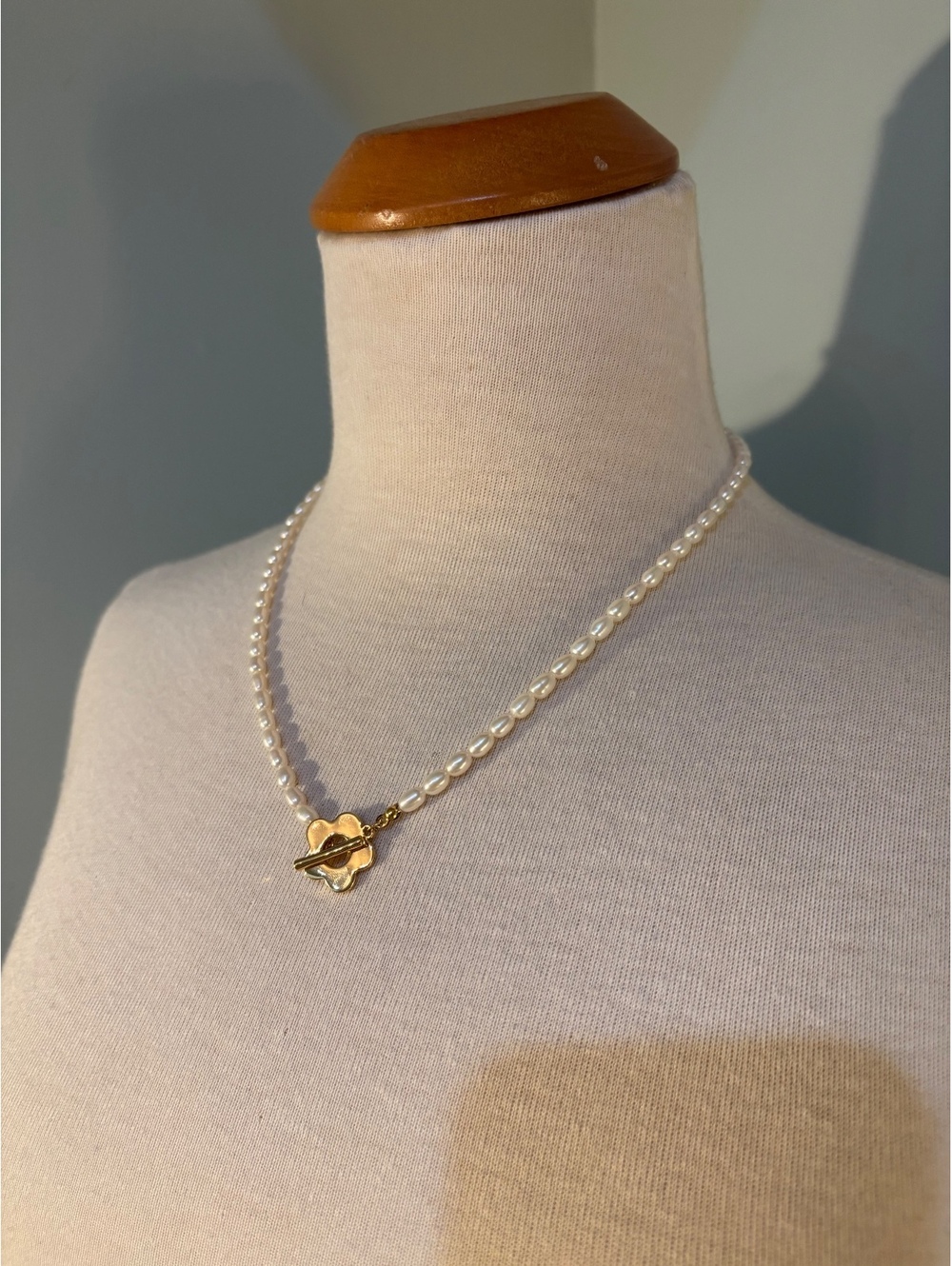 Elegant Pearl Necklace with Gold Flower Clasp